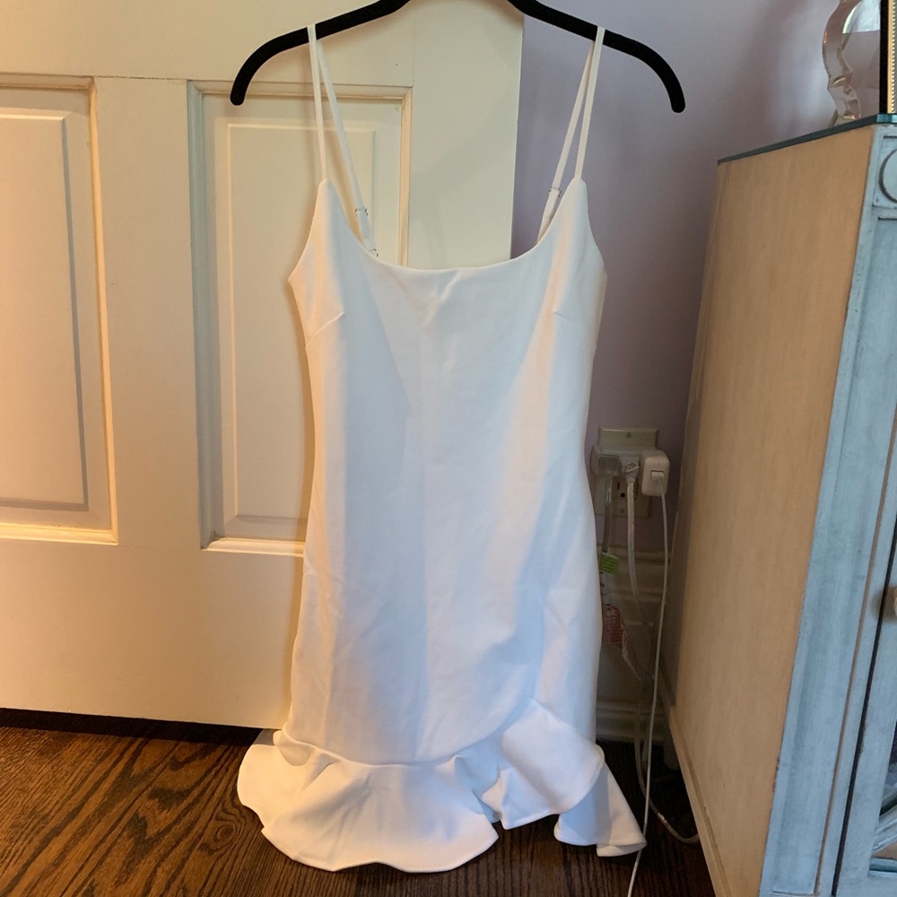 White dress with ruffles at bottom !!!